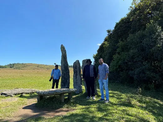 With office colleagues in field