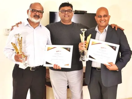L to R: Glocal CEO, Chairman and I with two Gold awards by FICCI