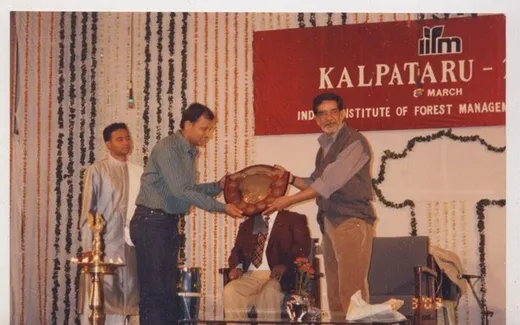 At Kalpataru, with Arif Hussain (PFM 2004) in the background
