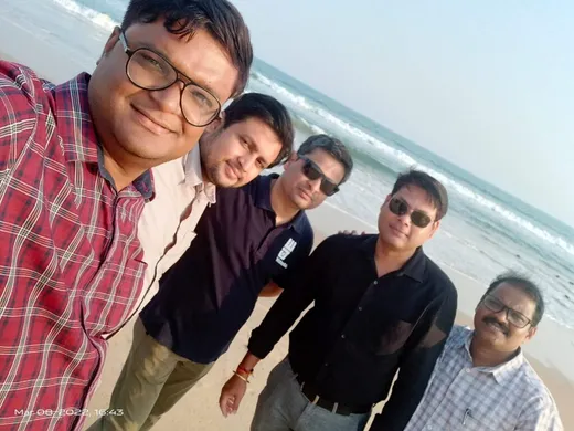 With colleagues at Puri