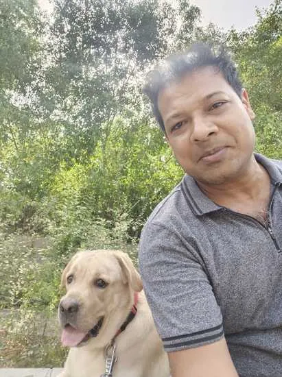 Prabhat with his dog Bubbles