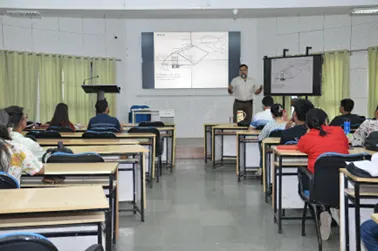 Delivering a classroom session at IIFM, 2026