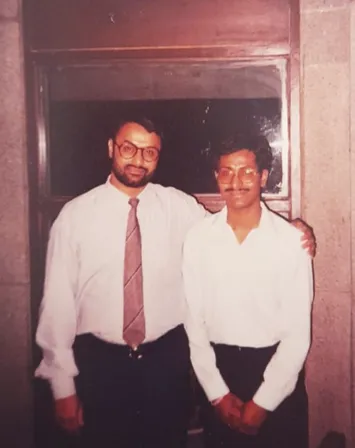 With Dr. C. S. Rathore
