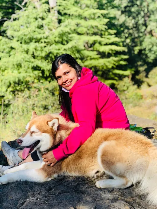 Enjoying the weekend with one of her dogs.