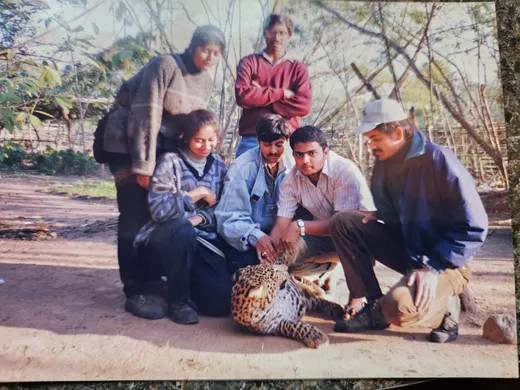 Petting a leopard cub in Baba Amte's ashram