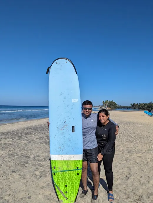 With husband surfing