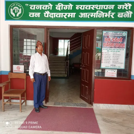 At the door of his office, Dhading