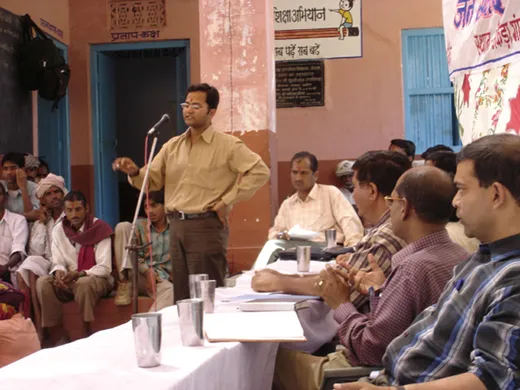 Public interaction in SPWD, at Jan Samvad in Udaipur (rural) 2005/06.. also seen is Mr Viren Lobo (dark shirt), Regional Director SPWD