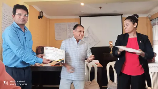 Receiving Certificate after Forest Inventory Training by Senior Forest Officer, Kathmandu, Nepal